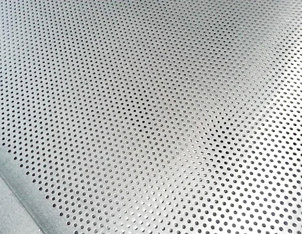 What are the characteristics of perforated mesh panels of different materials?
